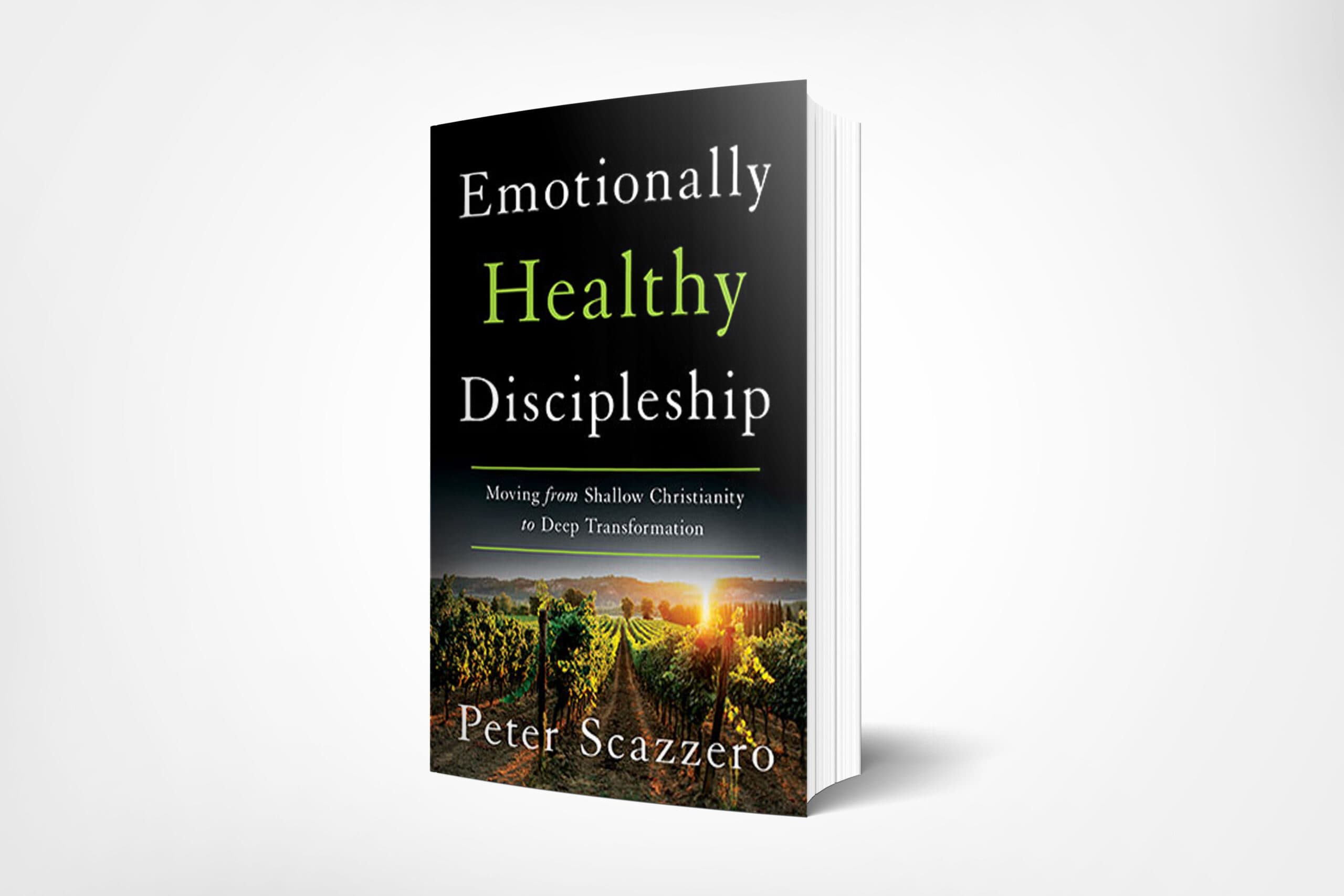 The book shown is Emotionally Healthy Discipleship: Moving from Shallow Christianity to Deep Transformation